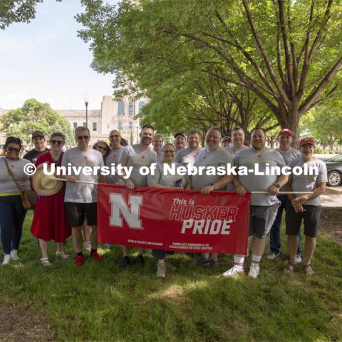 More than 20 members of the university community marched together during Lincoln's first Star City Pride parade. A number of campus administrators, including Chancellor Ronnie Green and his wife, Jane, participated in the walk around the Nebraska State Capitol. Star City Pride parade on June 19, 2021. Photo by Troy Fedderson / University Communication.